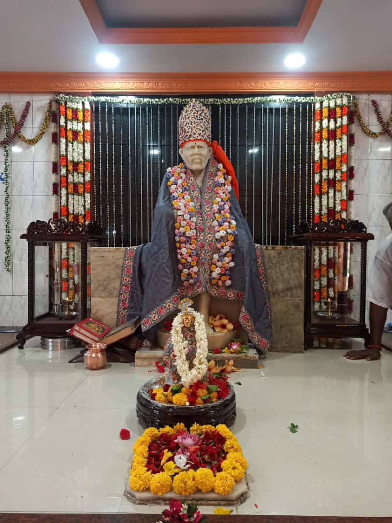 Shrine altar with murti and offerings
