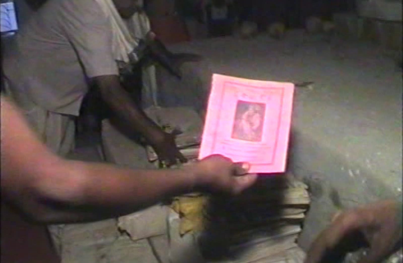 One of the Sai Naam notebooks placed beneath the altar